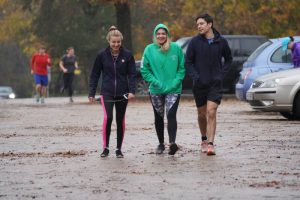 Trio of runners arriving on a cold morning