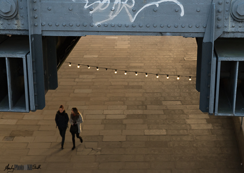 Couple walking evening street scene