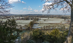 Shot of farm from Cliveden framed by trees