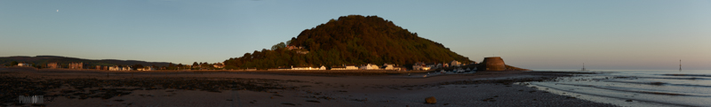 Long thin shot of the coast of Minehead from the sea