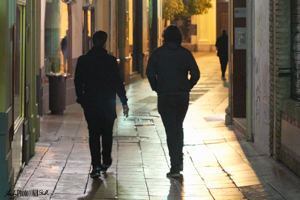 People in Silhouette Reflections