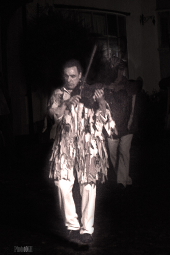 Ragged violin playing morris dancer