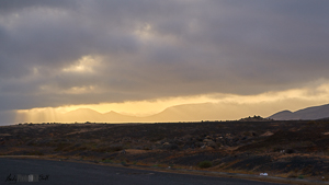 Gods rays from cloud over the horizon Lanzarote