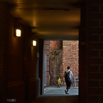 Man leaving alley i the City of London