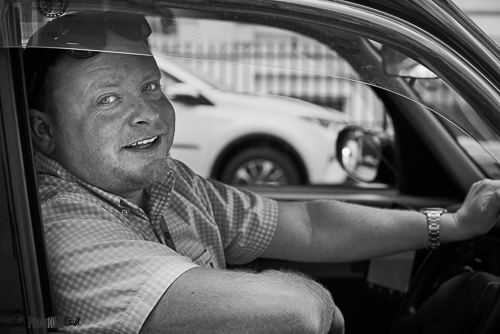 Black and white portrait of taxi driver