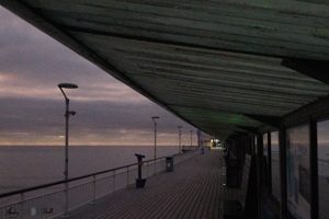 From under the cover of the pier along the pier