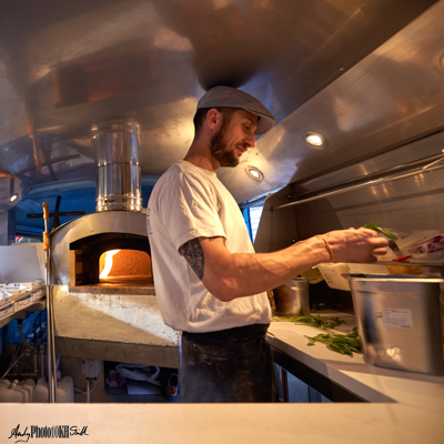 Inside the small van which is pizza Spitalfields