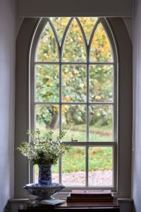 Original arched window with flower pot Landmark Trust Northern Ireland