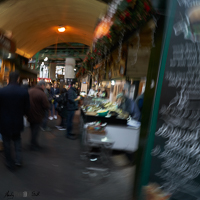 Greengrocer at Borough Market shot with radial intentional camera movement