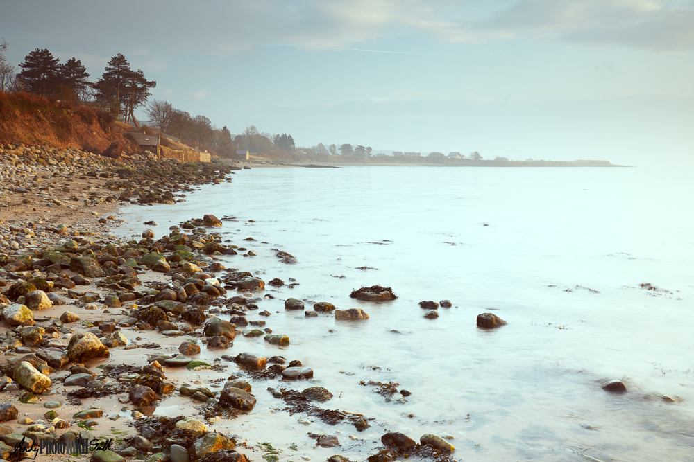 Shore of the Menai Strait at daybreak