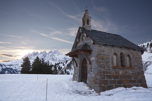 Church in Les Crosets with darkened sky