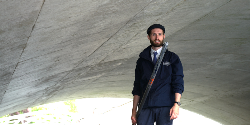 Man with Punt Pole Under Bridge on the Cam