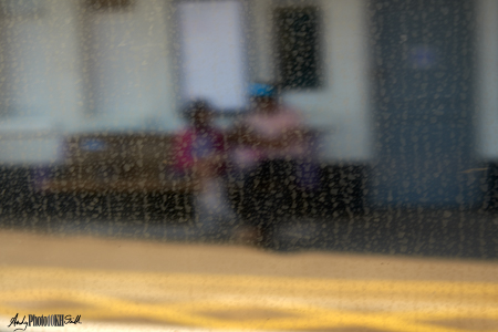 Mother and child on station bench