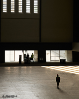 Silhouette of solitary figure in hall