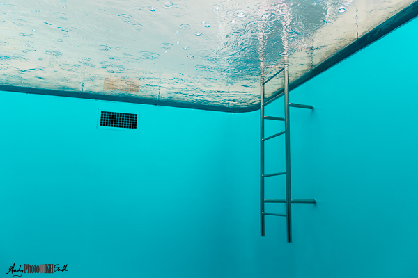 Underwater shot of a swimming pool whilst raining