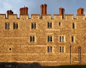 Castle Wall looking golden against blue sky