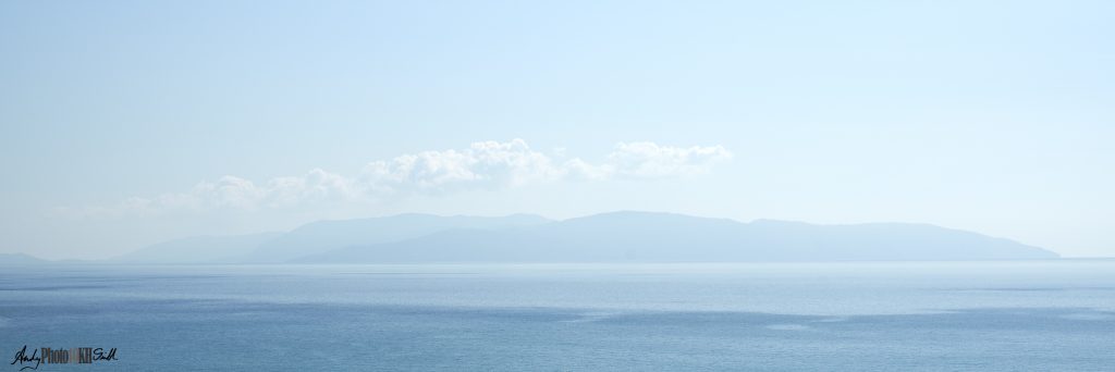 Recession of hills on Zakynthos, Greece as vied from Lourdas Beach Kefalonia