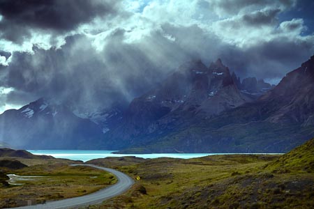 Dramatic clouds mountains and lake